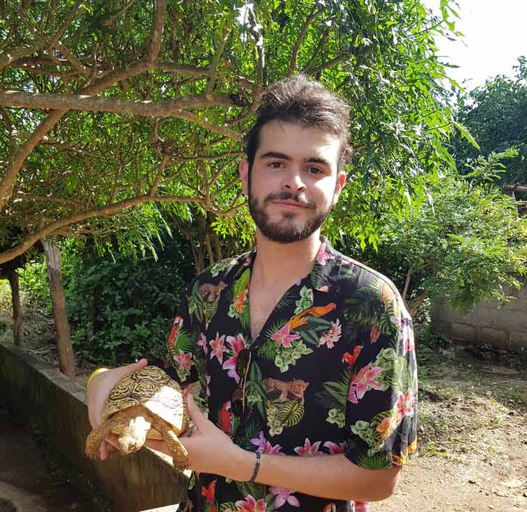 me holding a tortoise